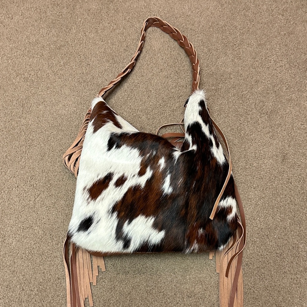Stylish Cowhide Shoulder Bag with Fringe